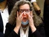 Frankfort resident Sherry Grutzius gets "weeping" during an academic pep rally to honor her achievements and those of Southland College Prep Charter High School