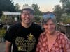 Edna White Garden director Kathy Figel welcomes Won Kim to the community garden’s second annual Asian Night Market Thursday, September 17.