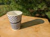 When people are called forward to pour water into the common vessel, you can bring your cup to the front, spill some “missing water” into the vessel, and then leave the cup behind next to the water ceremony vessel.