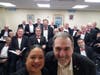 Orpheus Music Director John J. Palatucci with Jennifer Pascual, Music Director of St. Patrick's Cathedral, in foreground. Orpheus singers/members are seen behind them.
