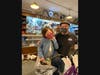 Beverly Bike & Ski owner Paul Weise helps Charlotte Moran pick out her new bike. Weiss and his wife Kathleen picked up the costs of the bikes this year.