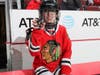 Honorary Captain Peter Whelan inspired the Chicago Blackhawks to victory in a shootout.
