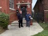 Dr. Stankiewicz shows Leo President Dan McGrath his boyhood home at 82nd and Elizabeth, just a three-minute run to St. Sabina Grade School, where he graduated in 1962. 
