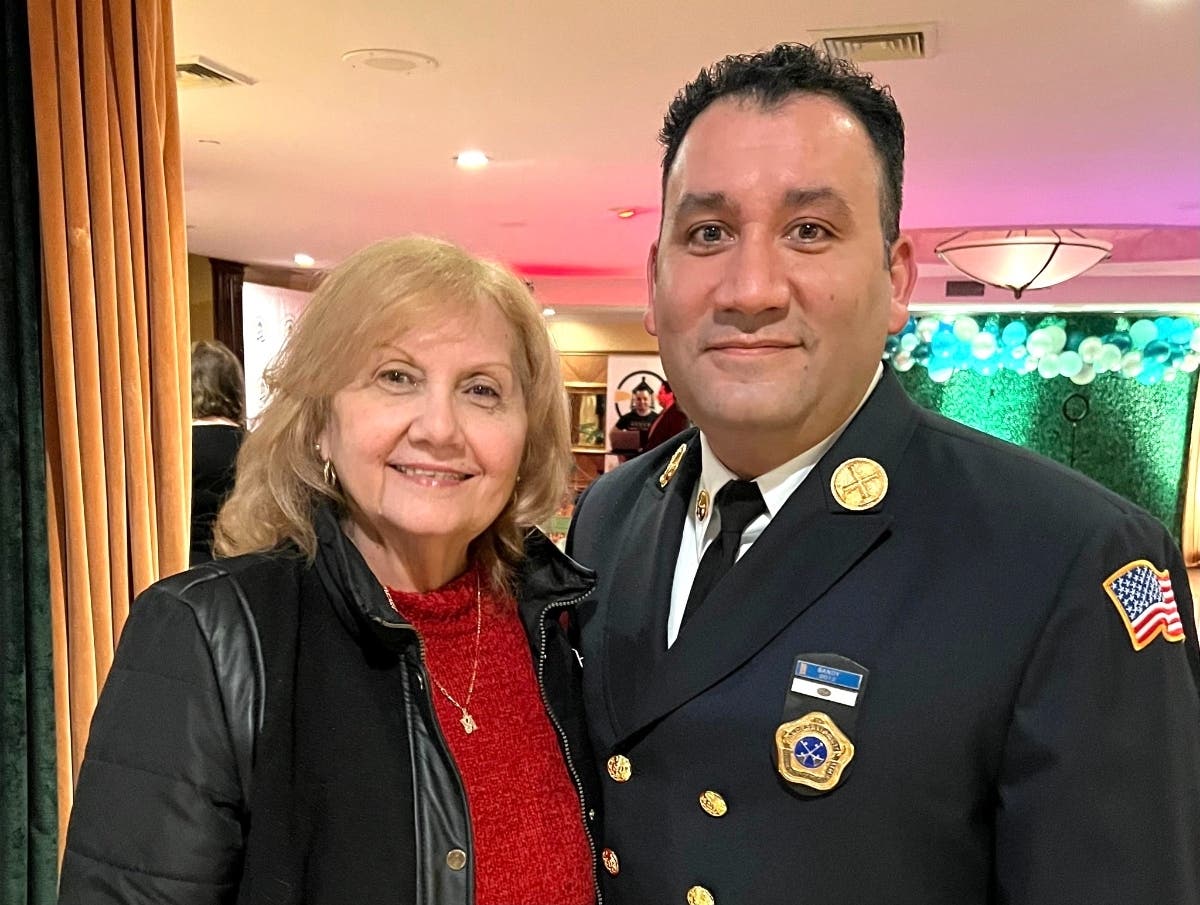 3rd Assistant Fire Chief Carlos Cardenas and his mother, Myrna Navas. Honored by the North Shore Hispanic Chamber of Commerce, Cardenas is the first Hispanic to achieve the rank of 3rd Assistant Chief within the City of Glen Cove’s Fire Department.