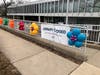 Balloons in front of the library bring smiles today