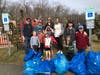 The residents who helped to clean Snyder Avenue Park display their bags of litter they gathered