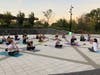 LeeAnn Gerrato Leads Attendees in Mindful Meditation at Sunset at the End of the First Yoga Flow Session