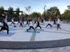 LeeAnn Gerrato Guides Participants Through Their First Lunge of the Evening