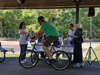 Township Councilman Manny Couto Demonstrates Exercise in Action as He Drives By to Pick Up His Prize