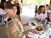 Cub Scouts from Pack 368 Transport Samples of Each Dish to the Judges