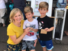 Christine Cantner and Her Two Sons Show Off Their Trophy and Prize for Their Second Place Dessert Dish: Aiden and Cameron’s Zesty Lemon Cake 