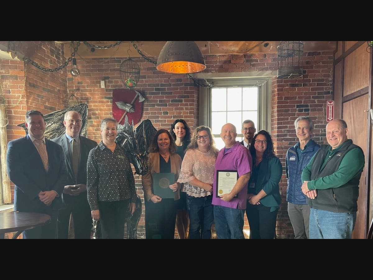 Group smiling posing for a photo 