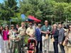 Troop 132 and Pack 132 scouts with Assemblyman Sterley Stanley, Councilman Dinesh Behal, County clerk Nancy Pinkin, EB Economic Development Officer Rob Zuckerman, 