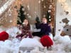 Two little girls visit the winter wonderland room at Windmill Vineyard & Winery