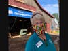CBMM President Kristen Greenaway wearing her Four Square man mask a New Zealand icon.