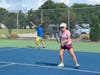 Victor and Sue hit the tennis court just for fun. 