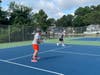 Martin and Lou play a game of doubles at Ocean Pines Tennis Court. 