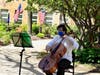 Seth MacLeod, cellist - Wellesley Symphony Orchestra plays at a safe social distance in the courtyard of the Elizabeth Seton Residence