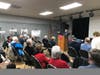 San Gorgonio Pass Historical Society President Sean Balingit introduces Mary Lamb Flake.