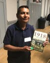 Leslie Rios wins the free book drawing at the San Gorgonio Pass Historical Society's meeting on April 11.