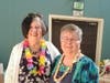 Soroptimist members Sue Burcham, left, and Donna Lester volunteer at the Soroptimist Bunco event.