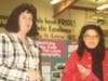 Educator Sue Burcham, pictured left at a school district science fair in the 1980s.