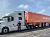 Gebrüder Weiss and Delta Logistics team members prepare to deliver the mask and face shields to essential workers. 