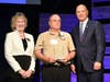 Barbara Richardson, director of Housing and Community Services, left, and Harford County Executive Bob Cassilly, right, congratulate Len Nicewonger the 2024 Harford’s Most Beautiful Ripple Effect Award recipient. 