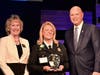 Barbara Richardson, director of Housing and Community Services, left, and Harford County Executive Bob Cassilly, right, congratulate Rhonda Hinch the 2024 Harford’s Most Beautiful First Responder Award recipient. 