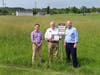 Harford County Executive Bob Cassilly, right, is joined by Parks and Recreation
Maintenance Administrator Steve Condax, left, and Parks and Recreation Director Paul Magness, center, at one of the Low Mow areas in Schucks Regional Park in Bel Air.