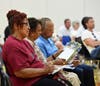 Attendees listen closely as County Executive Bob Cassilly addresses the audience during the Southern County Taskforce community input meeting Monday evening in Edgewood.