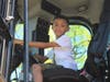 Eight Year old Marvelo Parks having fun inside a vehicle