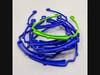 A stack of mask shield frames 3D printed by library staff.