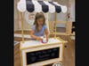 A girl playing. *Photos shared with full parental permission.