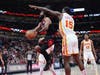 On one of his best career nights, Coby White (Bulls) shows full speed on this drive against three Hawks defenders.