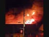 Yet another close-up of the very active blaze being fought.
