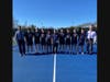 The SJP Tennis team celebrates Coach Metropolis’ 500th career win alongside Prep AD Jameson Pelkey and Principal Keith Crowley.