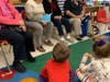 Children and Brandywine residents discuss Dr. Seuss story Fox in Socks 