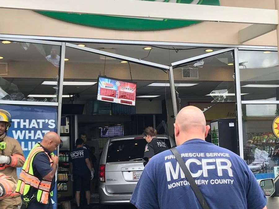 A minivan struck a pedestrian before smashing into a BP Gas Station store in Gaithersburg on Tuesday.