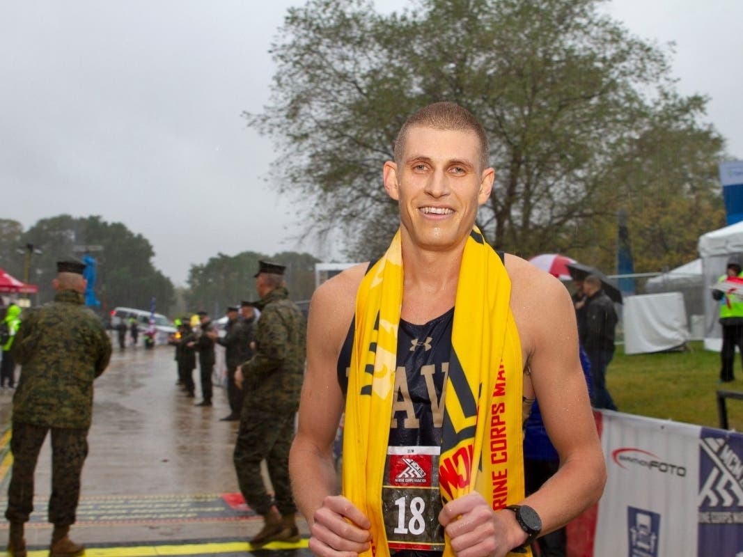 The rain didn't stop Silver Spring's Jordan Tropf from winning the 44th Marine Corps Marathon on Sunday.