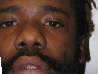 Authorities say officers and a K9 caught a man robbing a Capital One bank in Silver Spring Sunday morning.