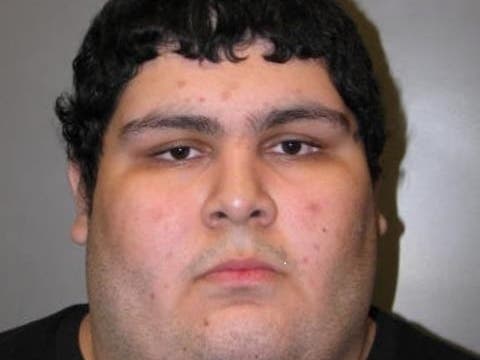 A former John F. Kennedy High School student who threatened to shoot people on campus has been arrested, police said.