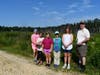 Resource Interpretive Specialist Andrew Anderson leads girls on a hike through Double Trouble State Park. 