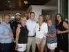 Golfers unwind after the Girl Scout Golf Classic, which raised $89,000 to support Girl Scout programs. 