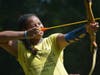 Taking aim at developing new skills at Camp Amity Acres.