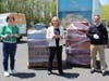 Girl Scouts of the Jersey Shore CEO Eileen Higgins, Fulfill CEO Kim Guadagno and OceanFirst Bank President, Central Region, George Destafney with 10,000 boxes of love.of 