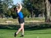 Valerie Sculthorpe, a branch manager with Investors Bank (a presenting sponsor of the Girl Scout Classic), takes a swing. 