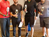 The 2019 tournament champions received a trophy and a free round of golf for their score of 65