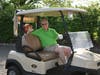 Dennis Wilson, DDNJ President and CEO, waves from his golf cart at DDNJ’s 33rd Annual Golf Classic.