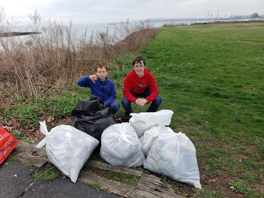 Zach and Noah doing their duty to clean Liberty State Park